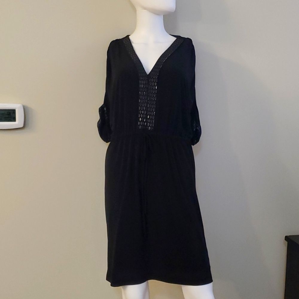 Calvin Klein black dress with metallic accents, 6, mid length